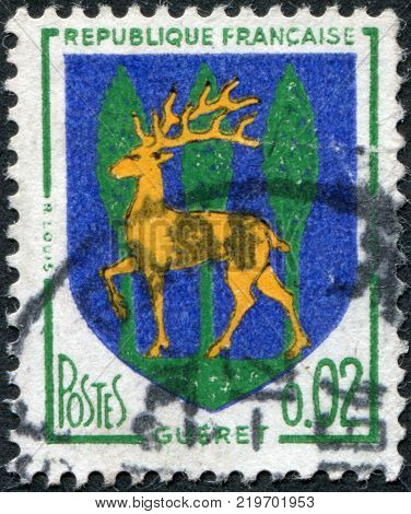 FRANCE - CIRCA 1964: A stamp printed in France depicts Arms of Gueret circa 1964