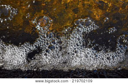 A small waterfall off the side of a water crossing