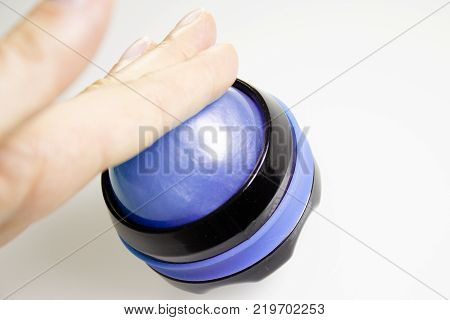 Rollon ball for relaxing body massage. Hand woman touching