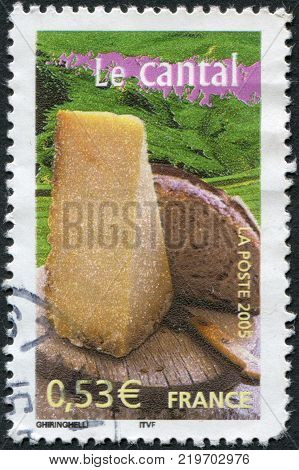 FRANCE - CIRCA 2005: A stamp printed in France shows the Cantal cheese and bread circa 2005