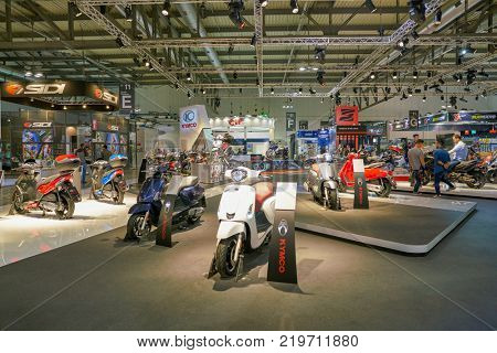 MILAN, ITALY - NOVEMBER 11, 2017: scooters on display at EICMA 2017 - 75th International Motorcycle Exhibition.