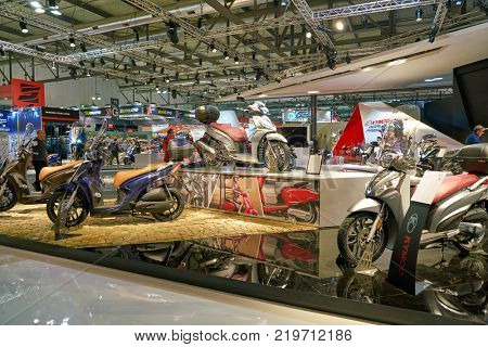 MILAN, ITALY - NOVEMBER 11, 2017: scooters on display at EICMA 2017 - 75th International Motorcycle Exhibition.