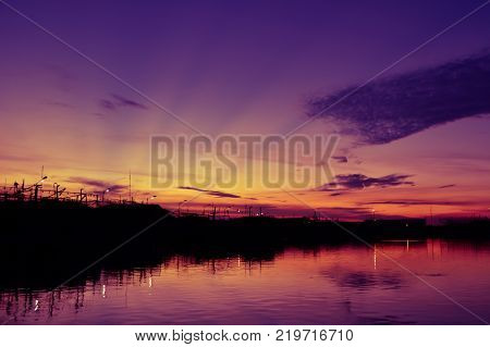 silhouette of fisherman's boats in the lake