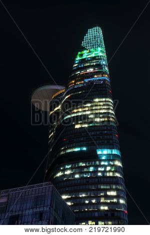 Ho Chi Minh City, Vietnam - December 21st, 2017: Architecture Bitexco tower at night with 68 storey 262.5 m Skyscraper built in 2011 is considered the tallest building in Ho Chi Minh City, Vietnam