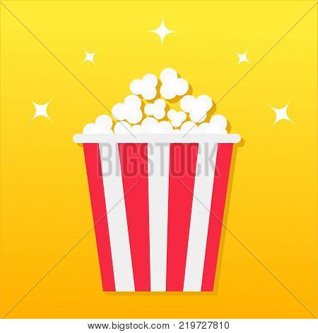 Popcorn box. Movie Cinema icon in flat design style. Pop corn icon. Yellow gradient background. Shining stars. Flat design. Vector illustration