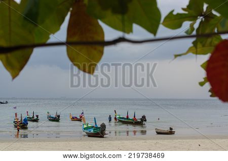 RAWAI BEACH, PHUKET ISLAND, THAILAND - FEBRUARY 28, 2016: long tailed boat at exotic Bay of Rawai in Phuket island Thailand