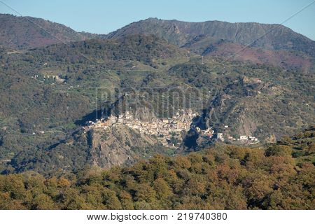 view of the Motta Camastra settlement on a sandstone ridge of the Peloritani Mountains, Sicily
