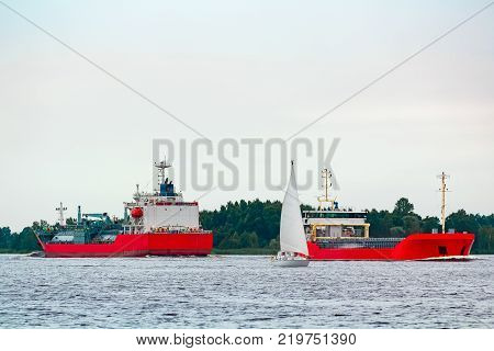Red Cargo Ship At Riga