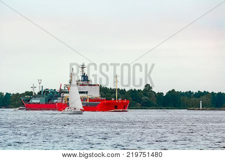 Red Cargo Ship At Riga