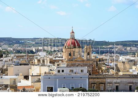 VICTORIA, GOZO, MALTA - APRIL 3, 2017 - View towards the city and Corpus Cristi Parish Church seen from the citadel Victoria (Rabat) Gozo Malta Europe, April 3, 2017.