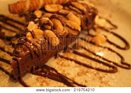 Macro Sweet Dark Chocolate Cake With Hazelnuts