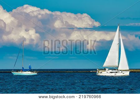 Sailboats Traveling By Baltic Sea