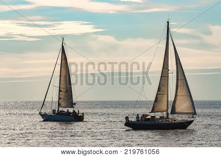 Sailboats Traveling By Baltic Sea