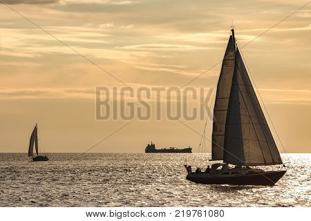 Sailboats Traveling By Baltic Sea