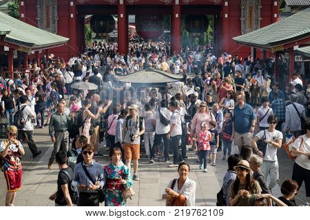 Tokyo - Japan, June 17, 2017; Tourists around Edo era Hozomon entrance of Sensoji, also known as Asakusa Kannon Temple, Asakusa  