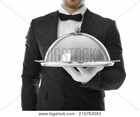 Waiter with metal tray and cloche on white background