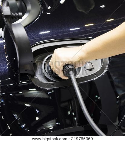 The Electric Vehecle ( EV ) charger ; selective focus