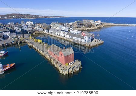 Rockport Harbor and Motif Number 1 aerial view in Rockport, Massachusetts, USA. This building is a fishing shack built in 1840, and now is the the most famous symbol of New England maritime life.