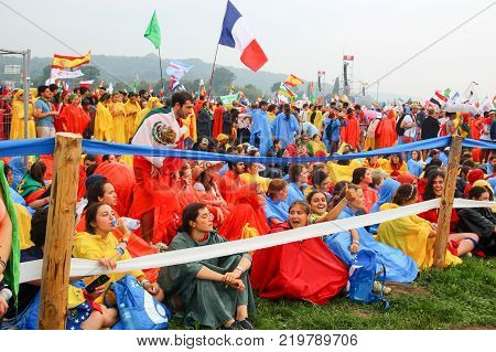 KRAKOW POLAND - 2016: Krakow Blonia World Youth Day 2016 pilgrimi listen to the Pope
