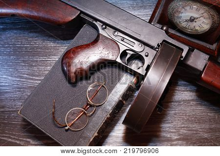 Old USA submachine gun closeup on dark background