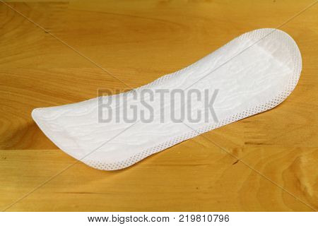 White pantyliner for women's hygienic protection on a table