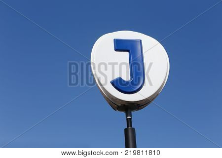 Nynashamn Sweden - July 24 2015: One letter J sign at the Nynashamn commuter train station in the Greater Stockholm area.