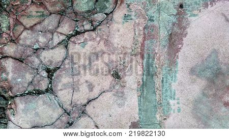 Old vintage cement messy cracked wall, grunge brick textured background, panoramic photo