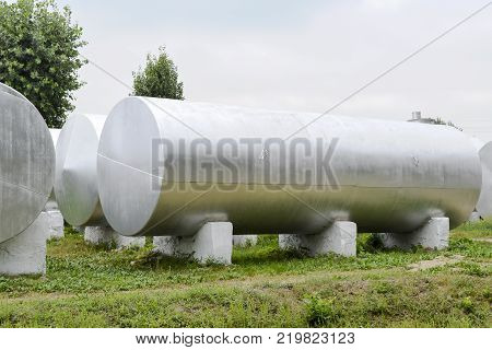 Silver tanks for storage of fertilizers. Agricultural buildings.