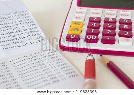 account passbook for management of business and check money with calculator