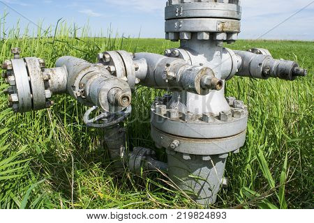 Flanges on the downhole equipment. Equipment of an oil well. Shutoff valves and service equipment.