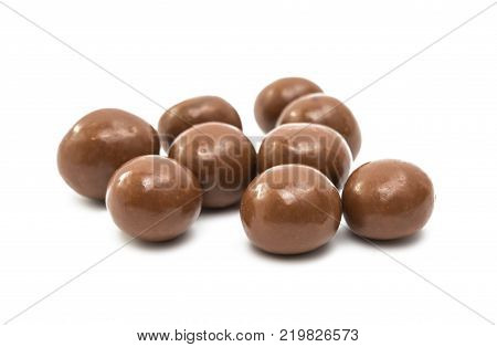 chocolate dragee balls isolated on white background
