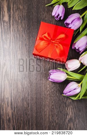 Mimosa And Paper On A Wooden Background