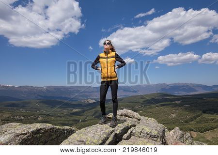 Woman On Top Of Mountain Typing Mobile