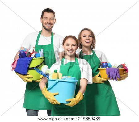 Team of young professionals with cleaning supplies, isolated on white
