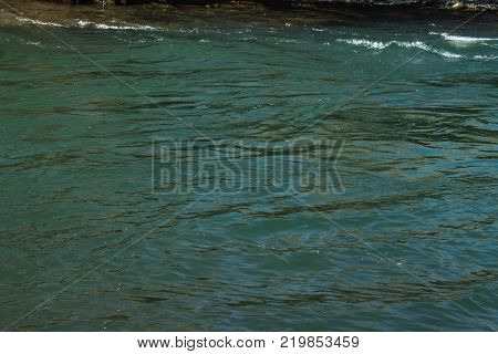 River in Winter. Rapids of Stormy River. Winter Landscape