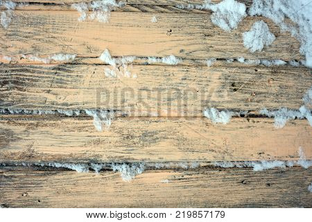 Old wooden background of boards with cracked and peeling paint