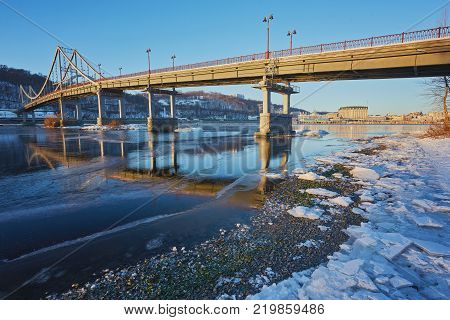 Evening view to Pedestrian bridge and Arc of a friendship of a nations in Kiev
