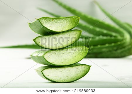 Slices of organic aloe vera., on a white background.