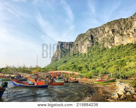 Many ships on the seawaves inthe twilight time in Thailand sea.