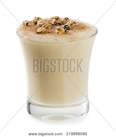 Boza, traditional Turkish drink with roasted chickpea isolated on white background.