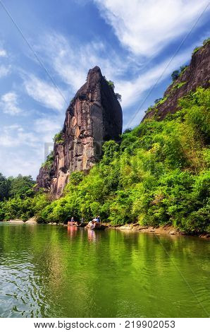 Rock formations lining the nine bend river or Jiuxi in Wuyishan or Mount wuyi scenic area in Wuyi China in fujian province
