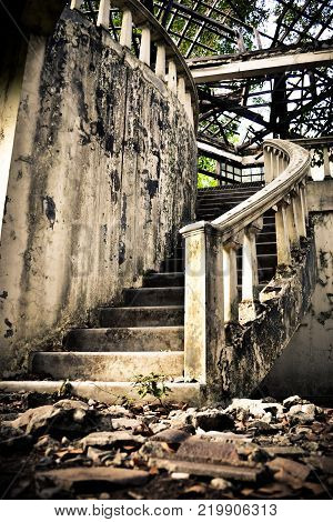 Old stairs in the old abandoned house