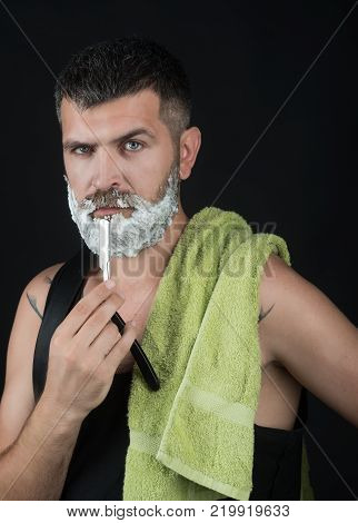 Serious Hipster In Barbershop, New Technology.