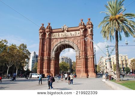 BARCELONA, SPAIN - NOVEMBER 1, 2017: Exterior of the historic Arc de Triomf. The landmark was built in 1888 as the entrance to the Barcelona World Exposition.