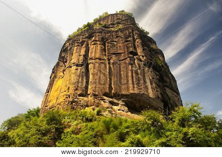 Rock formations lining the nine bend river or Jiuxi in Wuyishan or Mount wuyi scenic area in Wuyi China in fujian province