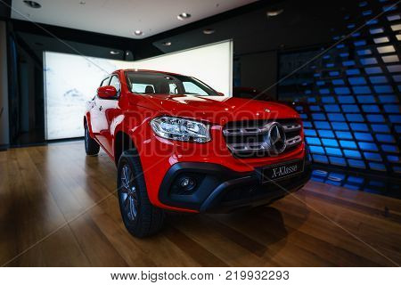 BERLIN - DECEMBER 21, 2017: Showroom. Mid-size luxury pickup truck Mercedes-Benz X-Class X220d 4Matic. Since 2017.