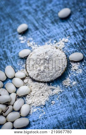 Close Up Of Ayurvedic Herb Kuanch,cowhage,mucuna Pruriens With Powder.