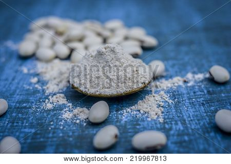 Close Up Of Ayurvedic Herb Kuanch,cowhage,mucuna Pruriens With Powder.