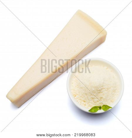 a piece of Parmesan cheese on white background with grated in ceranic bowl