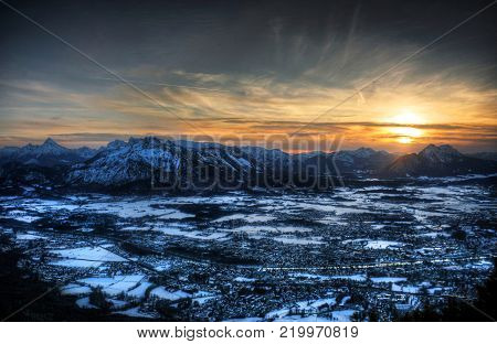 Panoramic view of the city of Salzburg, Austria at sunset as seen from Gaisberg.